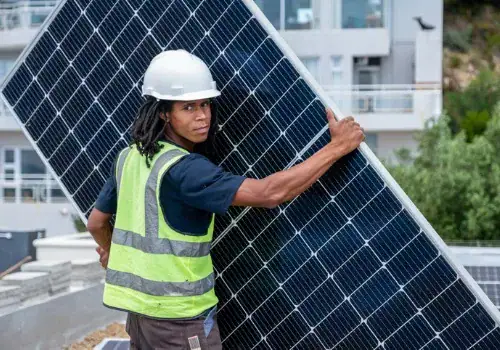 african man installing solar panels picture id1284214058.jpg