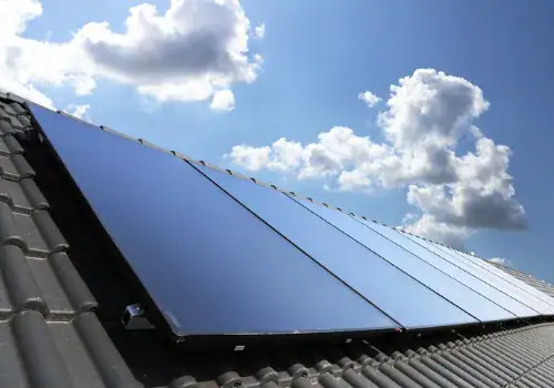 photovoltaic roof with solar panels picture id1033236964.jpg