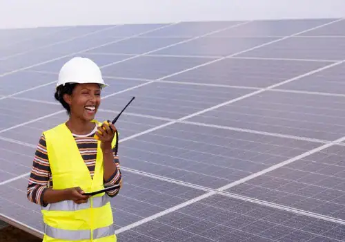 solar power station worker woman talking on walkietalkie picture id959801780.jpg