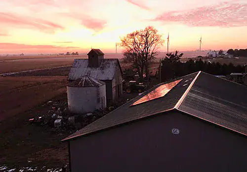 sun collectors solar panels at sundown.jpg