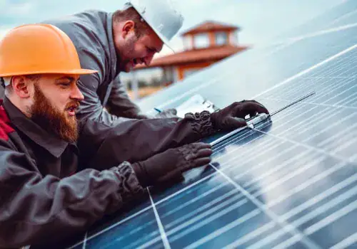 workers checking photovoltaic cells dimensions on rooftop solar panel picture id1259296430.jpg